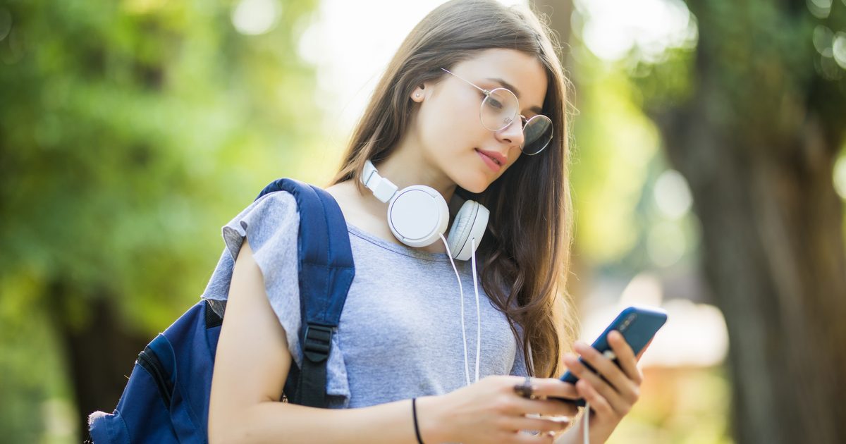 happy-beautiful-young-caucasian-girl-with-green-smart-phone-outdoors-sunny-summer-day-texting-smiling-a1ebcf2.jpg?resize=1200%2C630