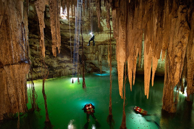 01-rays-slant-into-holtun-cenote-670