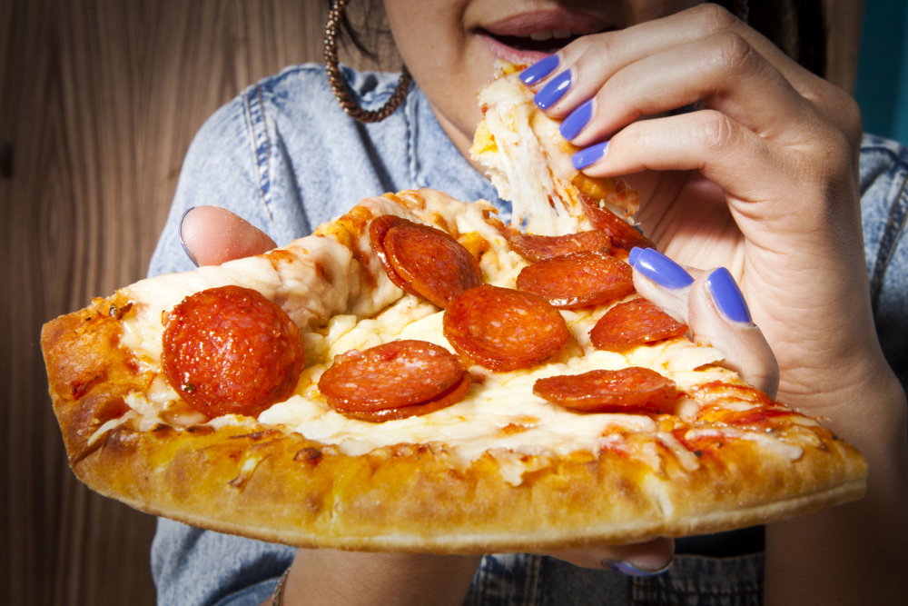 Pizza najbardziej uzależniającą potrawą w naukowym rankingu. Jak działa na mózg?