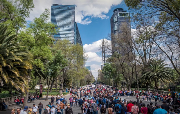 Crowds on Chapultepec Avenue looking towards city near Chapultepec Park, Mexico City, Mexico