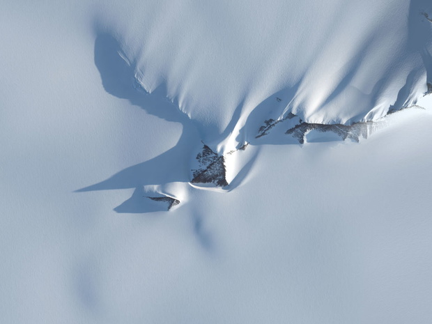 ANTARCTICA -- FEBRUARY 28, 2021:  Maxar medium view satellite imagery of a pyramid looking mountain in Antarctica.  Please use: Satellite image (c) 2021 Maxar Technologies.