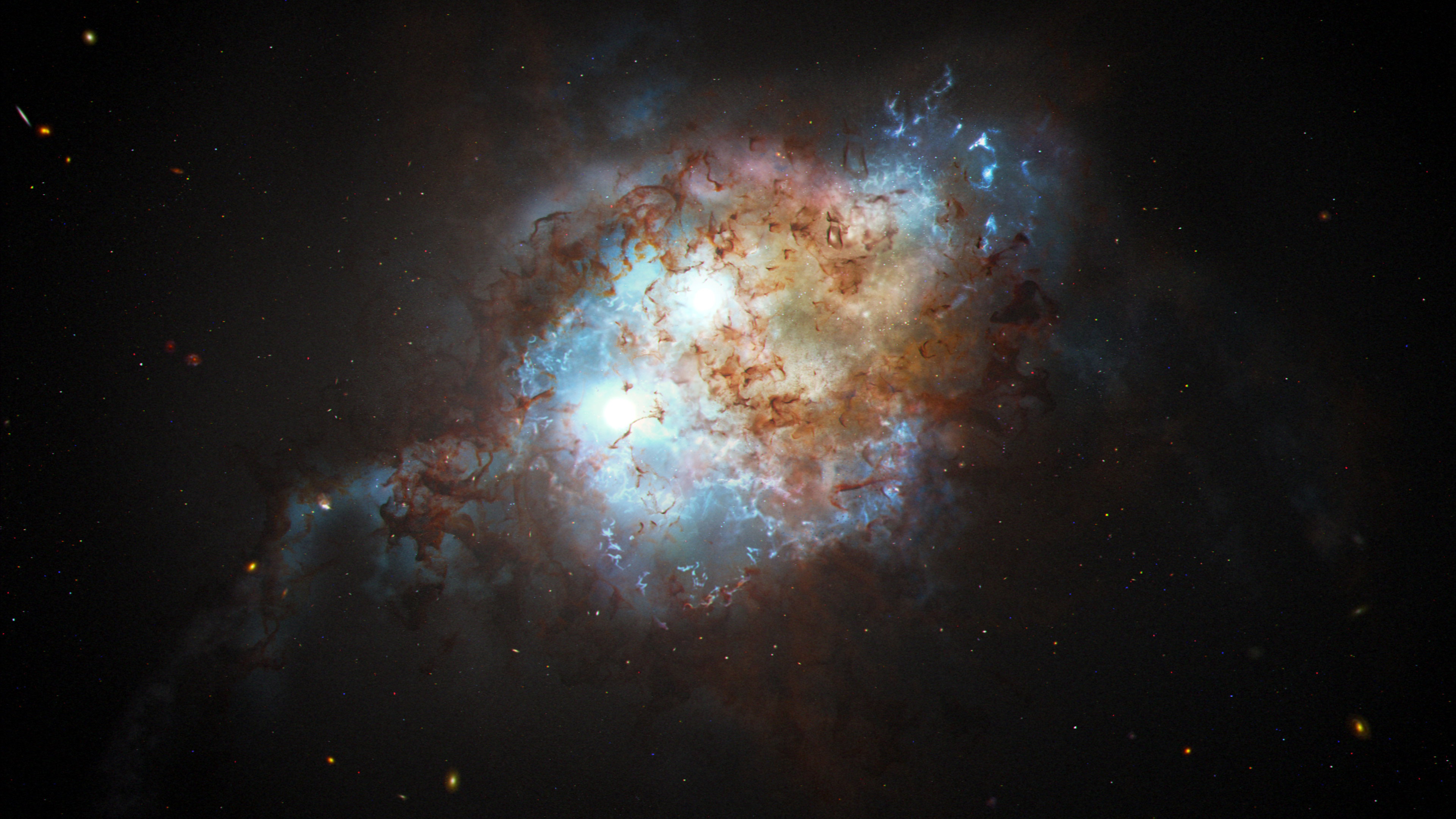 Odkryto dwie supermasywne czarne dziury, które znajdują się o krok od gigantycznej kolizji (ryc. NASA, ESA, Joseph Olmsted (STScI))