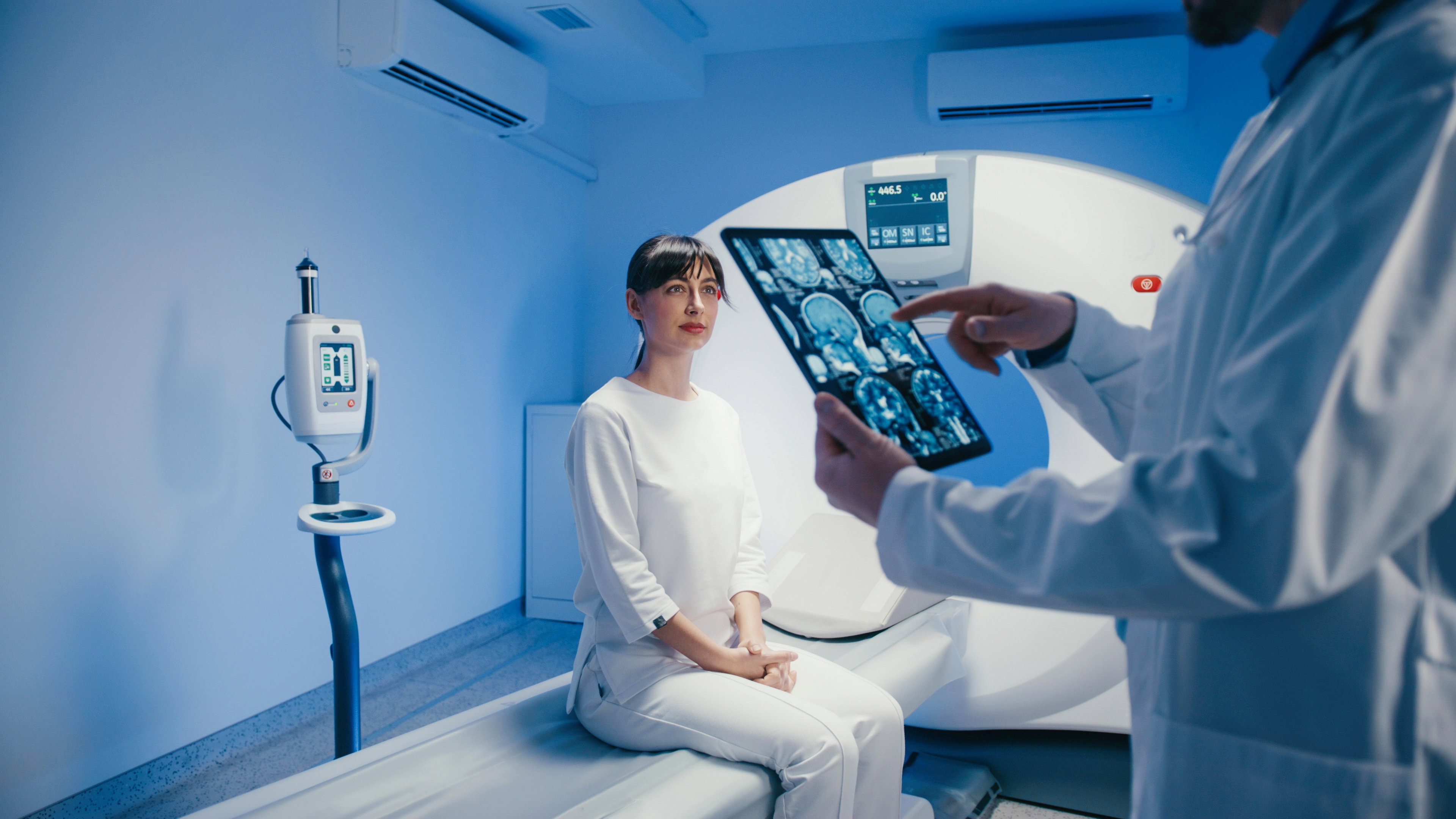 Calm,Caucasian,Female,Seated,On,Examination,Table,Focusing,On,Brain