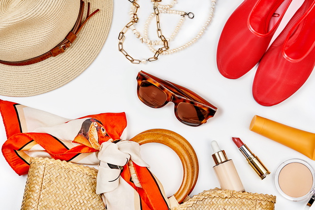 Set of Fashion Collection with Trendy Fashion Clothes and Make-up Cosmetic Products for women in red, beige, brown colours.