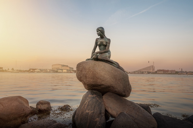 Little mermaid statue at sunset - Copenhagen, Denmark