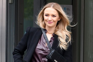 Basia Kurdej-Szatan w płaszczu i sukience Marc Cain