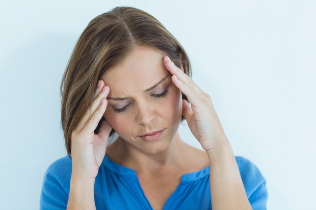 Woman suffering from headache