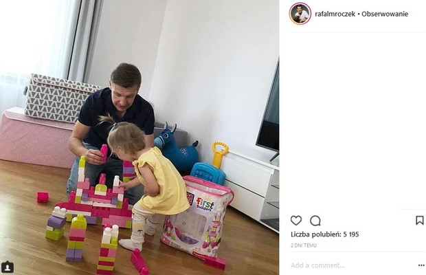 Rafał Mroczek z córeczką Zosią