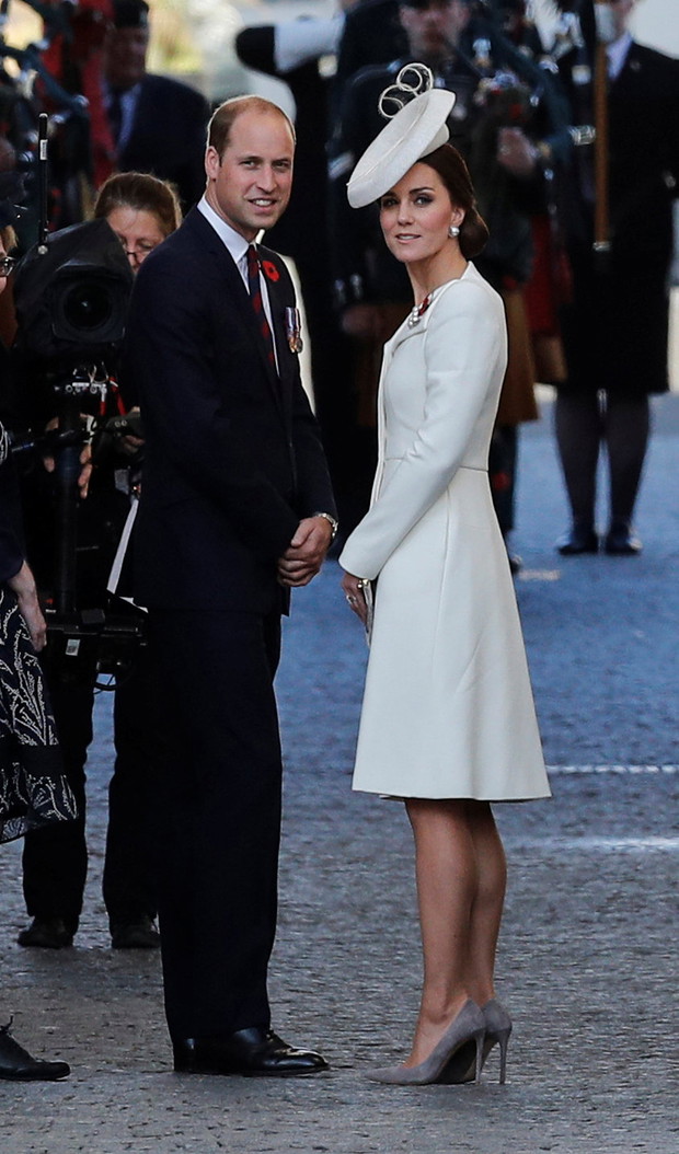 Britain's Prince William, the Duke of Cambridge and his wife Catherine, the Duchess of Cambridge make their way to the Last Post ceremony at the Menin Gate to mark the centenary of Passchendaele, The Third Battle of Ypres, in Ypres
