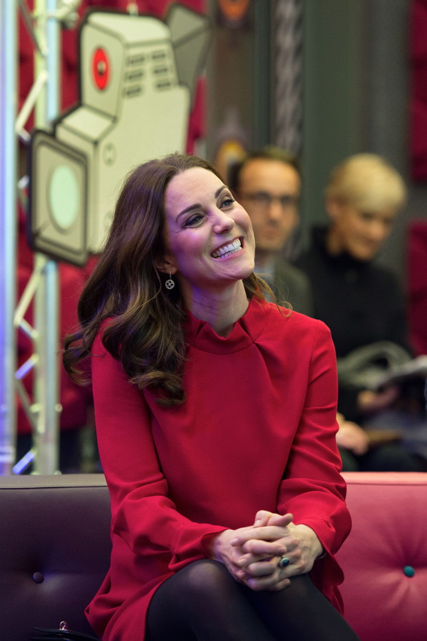 Britain's Catherine, Duchess of Cambridge listens to a question and answer session before speaking to school children taking part in a 'Stepping Out' session, at the BBC in MediaCityUK in Salford, north-west England on December 6, 2017. Britain's Cather