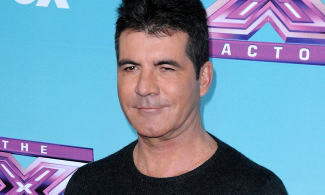 Simon Cowell został ojcem. Zdjęcia syna Simona Cowella