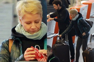 Małgorzata Kożuchowska i Bartek Wróblewski na lotnisku w Warszawie