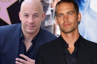 Paul Walker i Vin Diesel w filmie "Szybcy i Wściekli 7"