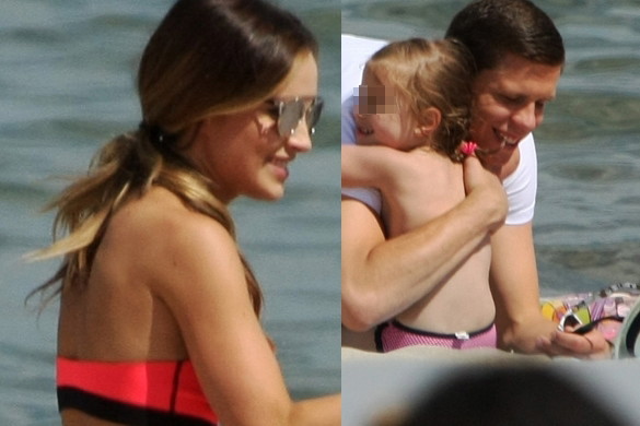 Marina Łuczenko i Wojciech Szczęsny na plaży w Sopocie