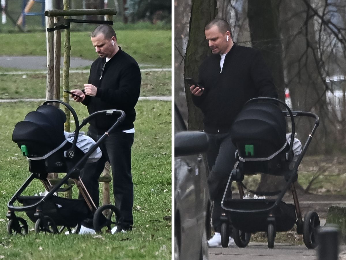 Marcin Hakiel z synem na spacerze