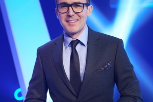Maciej Kurzajewski w garniturze
