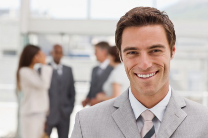 Portrait of happy young businessman