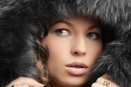 Beautiful woman. Winter fashion &amp; makeup