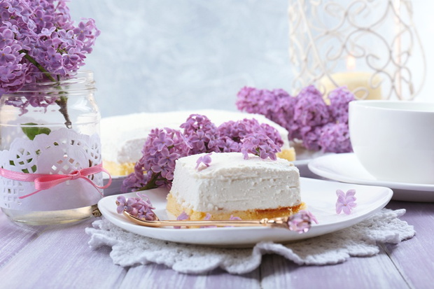 Delicious dessert with lilac flowers