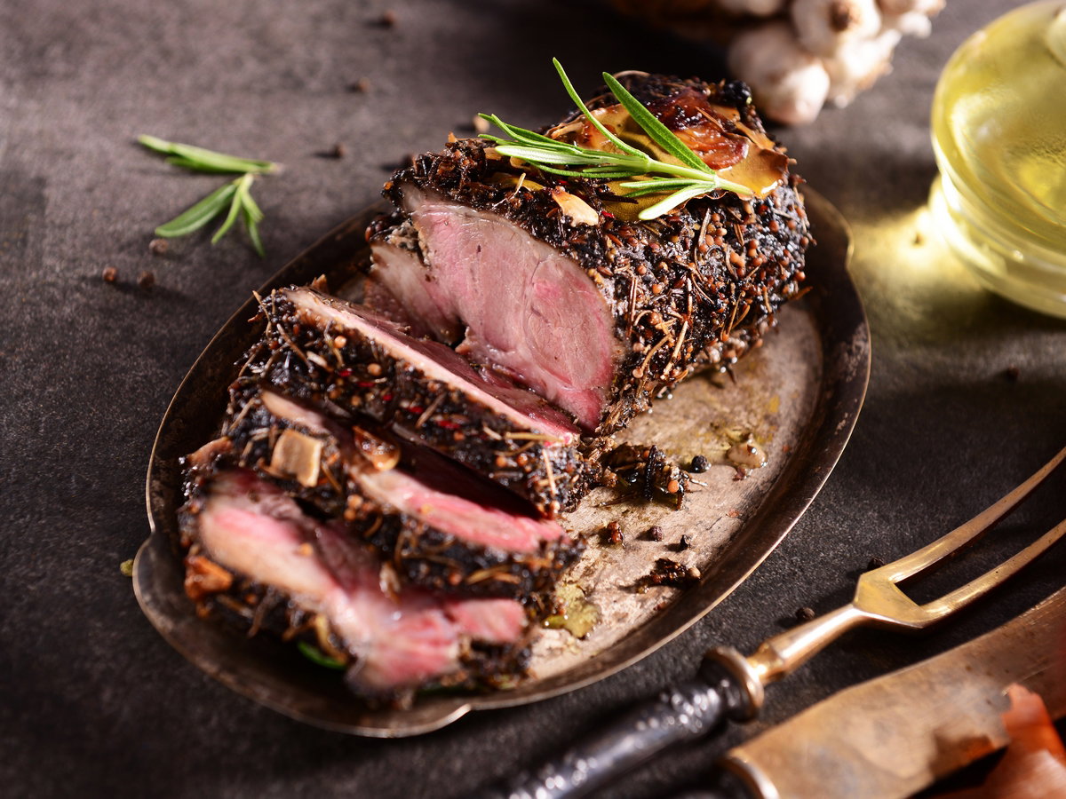 Baked pork ham with herbs
