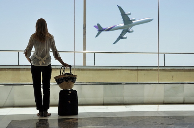 Girl at the airport window