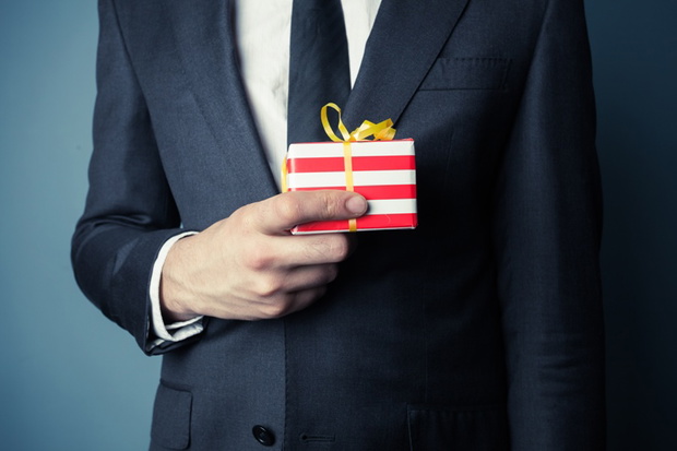 Businessman with small gift