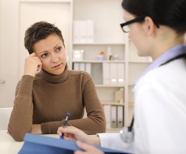 Psychologist and depressed patient at office