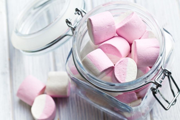 the sweet marshmallows in glass jar