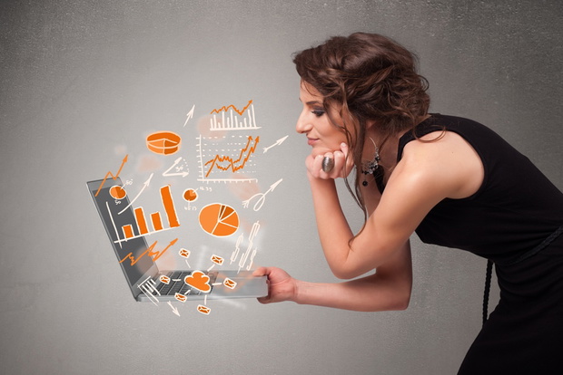 Beautiful lady holding notebook with graphs and statistics