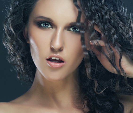 beautiful woman with long curly hairs