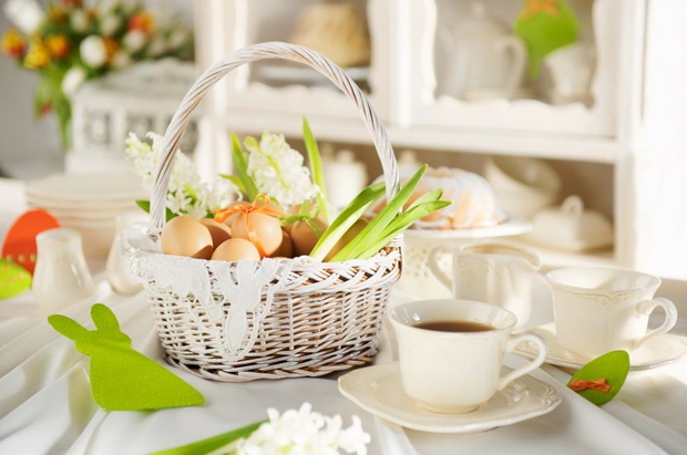 Easter basket full of eggs on a festive table