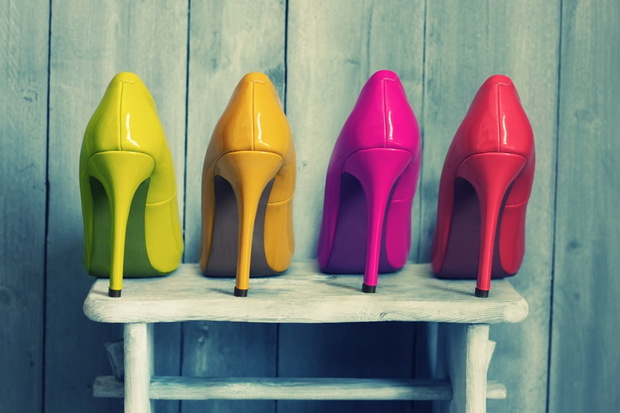 Retro photo of pink, yellow and red shoes