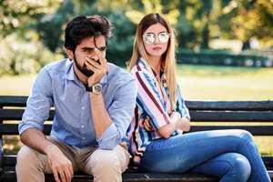 Problems in love relationships. Young couple in quarrel