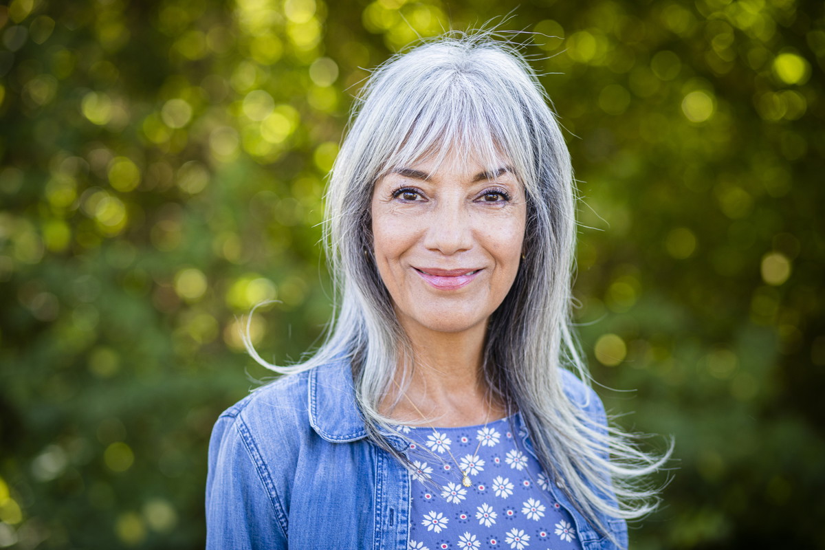 Beautiful happy senior woman with white hair