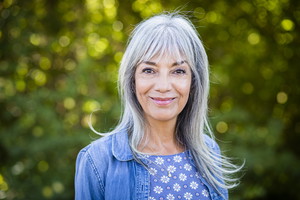 Beautiful happy senior woman with white hair