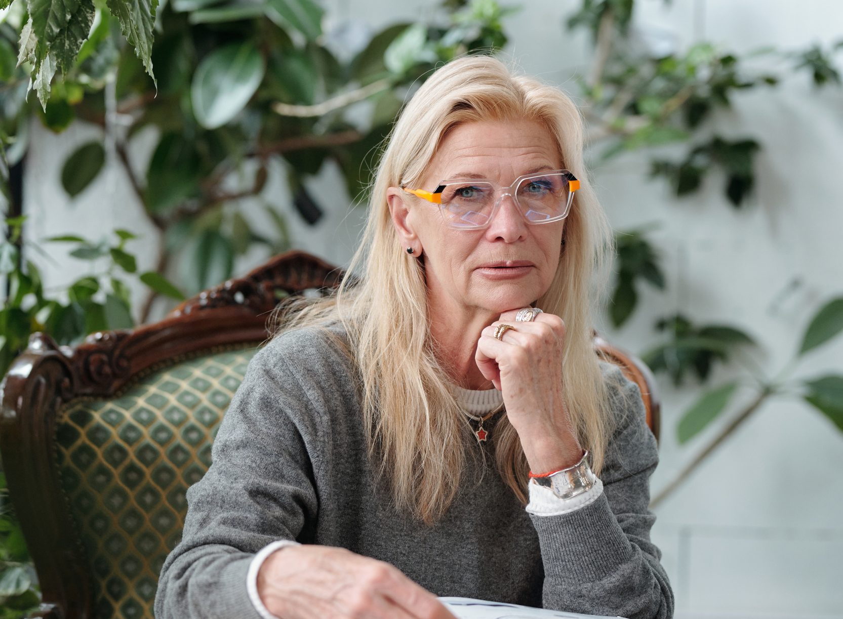 Portrait of Senior Caucasian Woman Using Tablet in Office