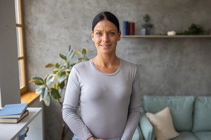 Portrait of a woman in a living room