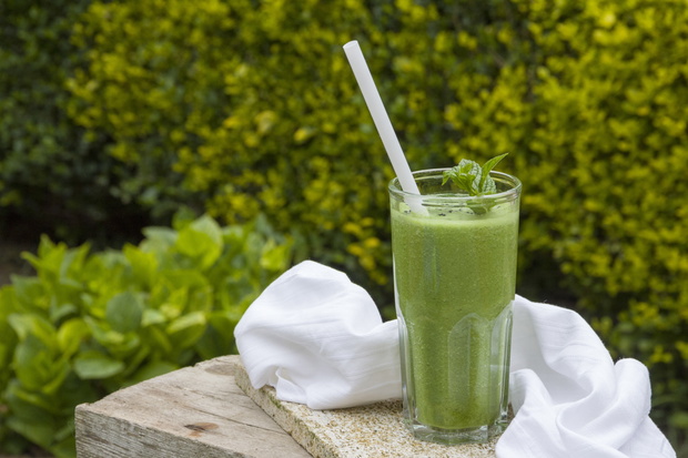 Green smoothie of spinach, cale, celery, green apple and parsley