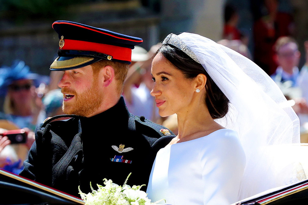 Meghan Markle i książę Harry w karocy