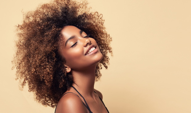 Beauty portrait of african american girl with clean healthy skin
