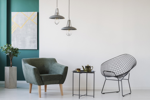 Coffee table between armchairs