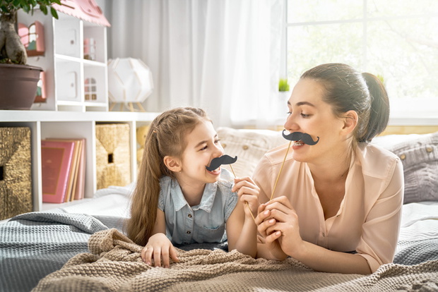 mother and daughter playing