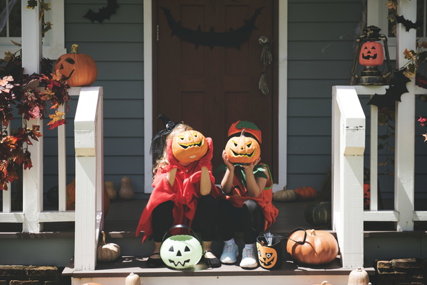Little children in Halloween costumes