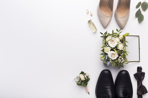 Wedding shoes and accessories on white background