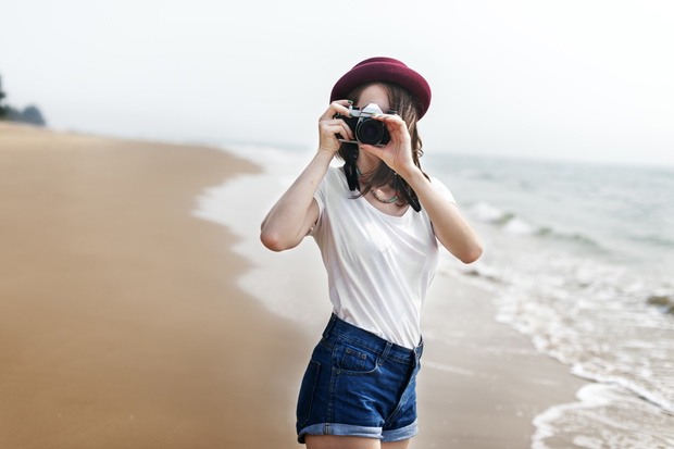 Woman Travel Photographing Beach Concept
