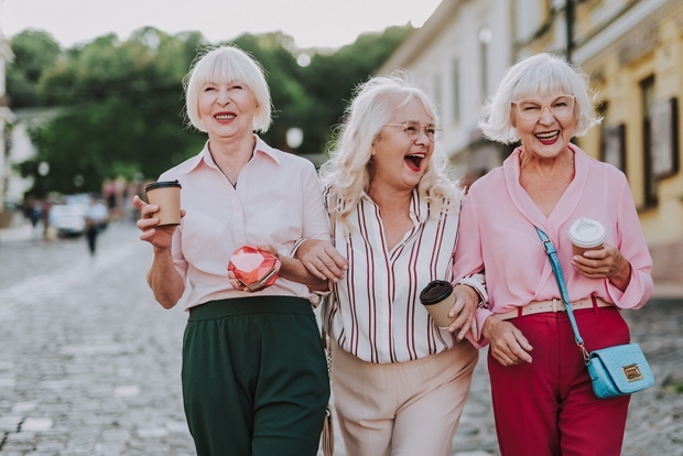 Pretty company of three friends having fun