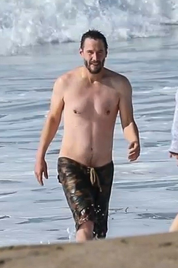 *EXCLUSIVE* Keanu Reeves shows off his very fit bod at 56 as he goes for a swim in Malibu **WEB EMBARGO UNTIL 12:15 PST on January 6, 2021**