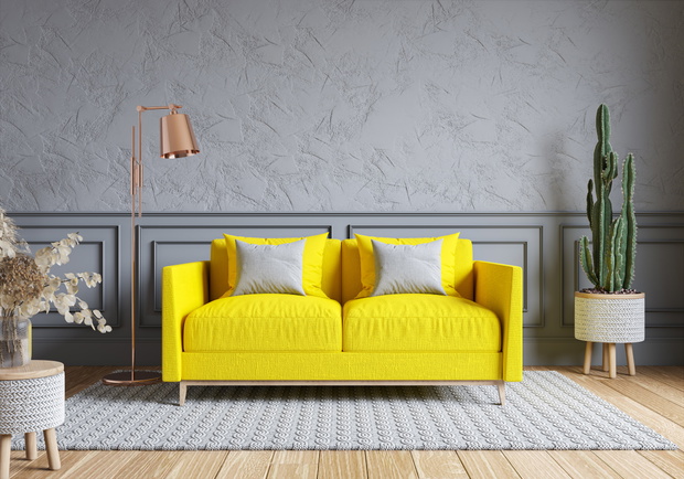 Modern living room and loft interior design. Yellow sofa on gray wall.Color of the year 2021. 3d render