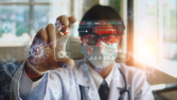 Doctor holding transparent tablet with futuristic hud screen tablet. Covid-19, Bacteria, virus, microbe. Medical concept of the future.