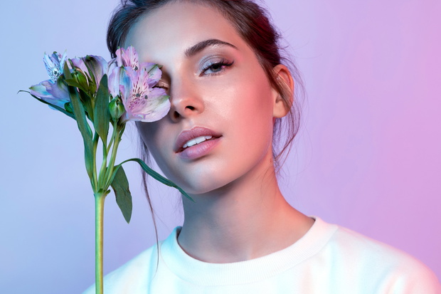Cute model with spring flowers